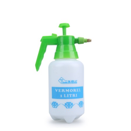  Valkoinen ruiskupullo vihreällä kahvalla ja yläosalla 